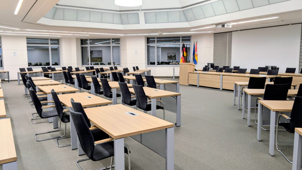 An empty conference room set up for a community meeting.